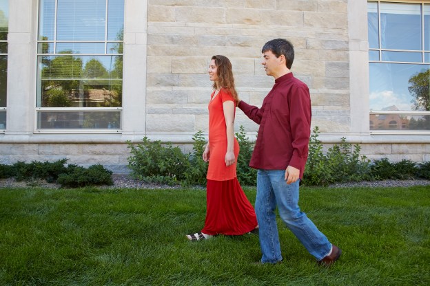 Jonathan Leathwood helping a student apply the Alexander Technique in walking